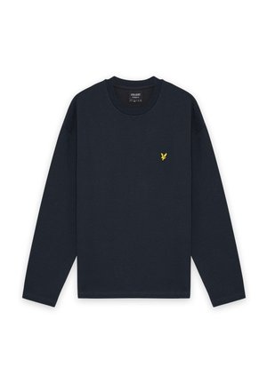 Mørkeblå langærmet T-shirt med rund hals og et lille gult fuglelogo på venstre bryst. Enkel, minimalistisk design.