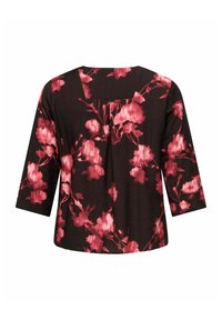Čierny top s tromi štvrtinami rukávov, s kvetinovým vzorom v odtieňoch ružovej. Textúrovaná tkanina s uvoľneným strihom a detailom v zadnej rozparku.