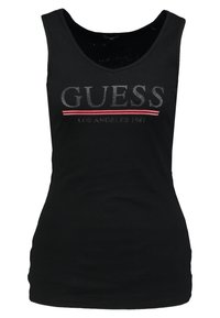 Canotta nera a coste con scollatura a girocollo, decorata con il logo "GUESS" in lettere grigie e rosse sul davanti.