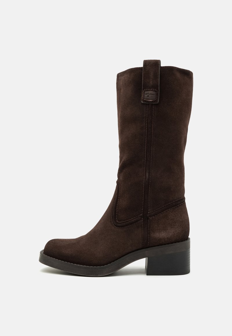 Dark brown suede knee-high boot with a curved silhouette, a sturdy block heel, and subtle stitching details along the side and toe.