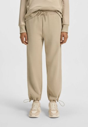 ELAPSED - Tracksuit bottoms - light beige five
