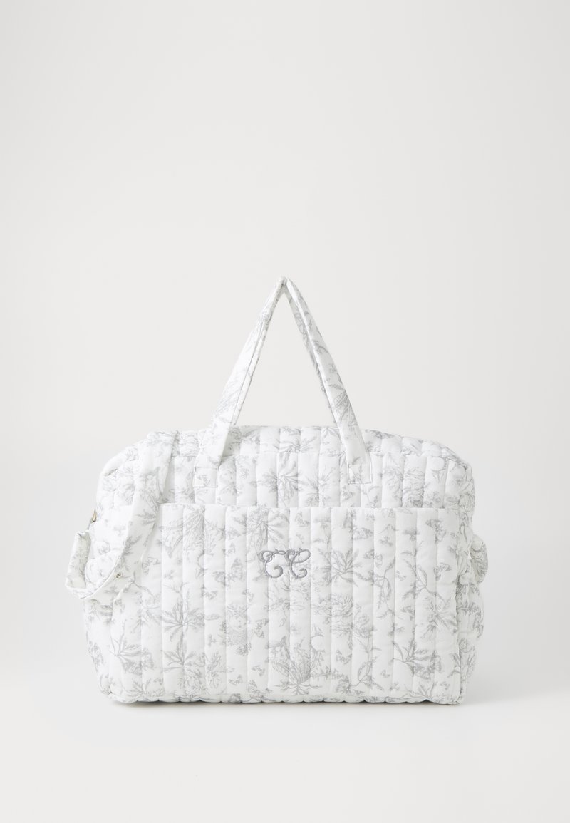 Vatteret hvid taske med blomstret grå mønster, to korte håndtag og en aftagelig skulderrem. Har et subtilt logo foran.