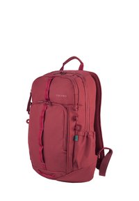Red fabric backpack with a smooth texture, dual zipper closure, front pocket, side mesh pocket, padded straps, and a top carrying handle.