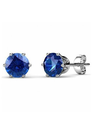 Orecchini a perno rotondi in cristallo blu con superficie sfaccettata, montati in metallo di tonalità argento, dotati di sei alette per una tenuta sicura.