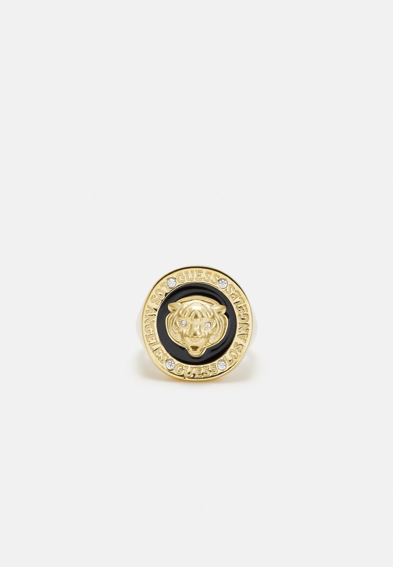 Bague dorée ornée d'un design en tête de lion, d'un centre en émail noir et de texte environnant avec de petits rhinestones clairs incrustés.