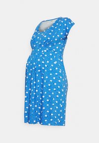 Vestuário de maternidade azul com mangas curtas, adornado com padrões florais brancos e bolinhas. Apresenta um design cruzado e tecido suave.