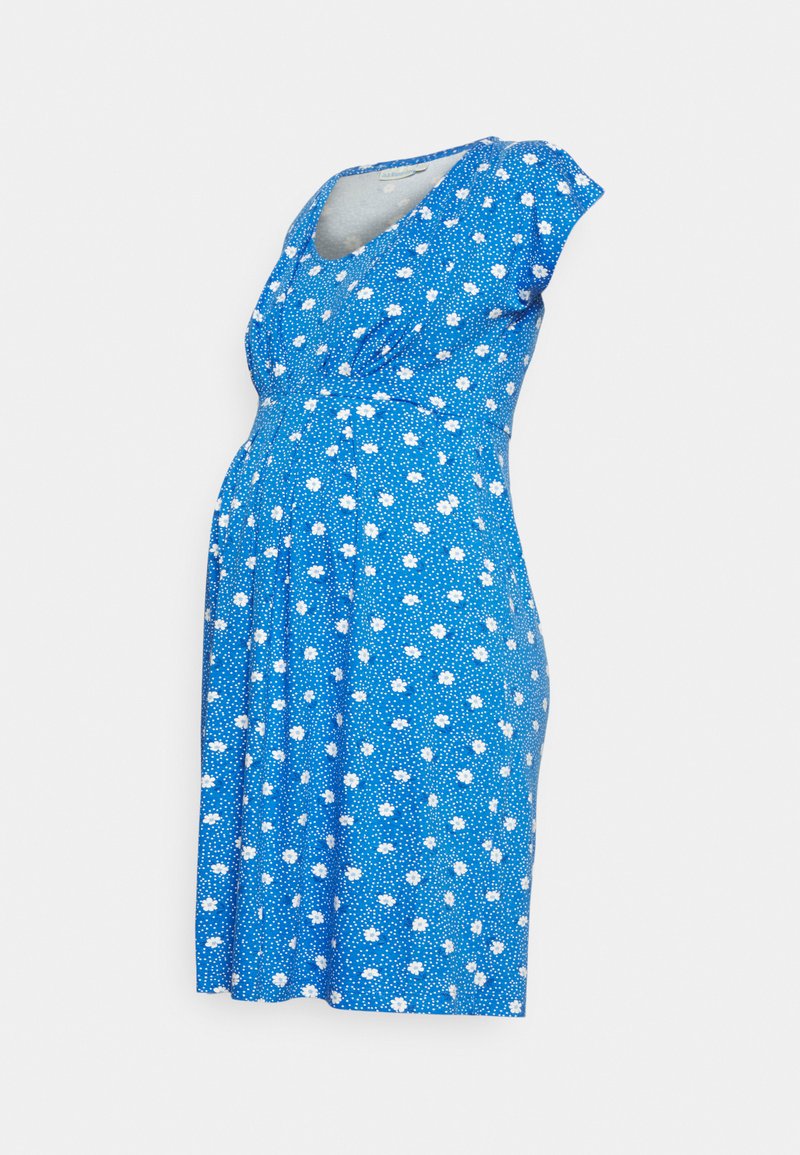 Vestuário de maternidade azul com mangas curtas, adornado com padrões florais brancos e bolinhas. Apresenta um design cruzado e tecido suave.