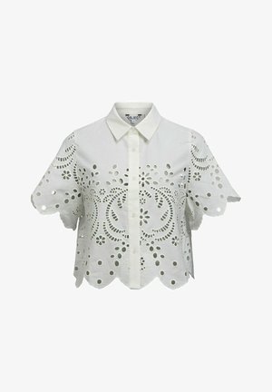 Bela srajca s kratkimi rokavi, gumbi in vezenino z izrezki cvetličnih vzorcev ter valovitim robom, s klasičnim ostrim ovratnikom.