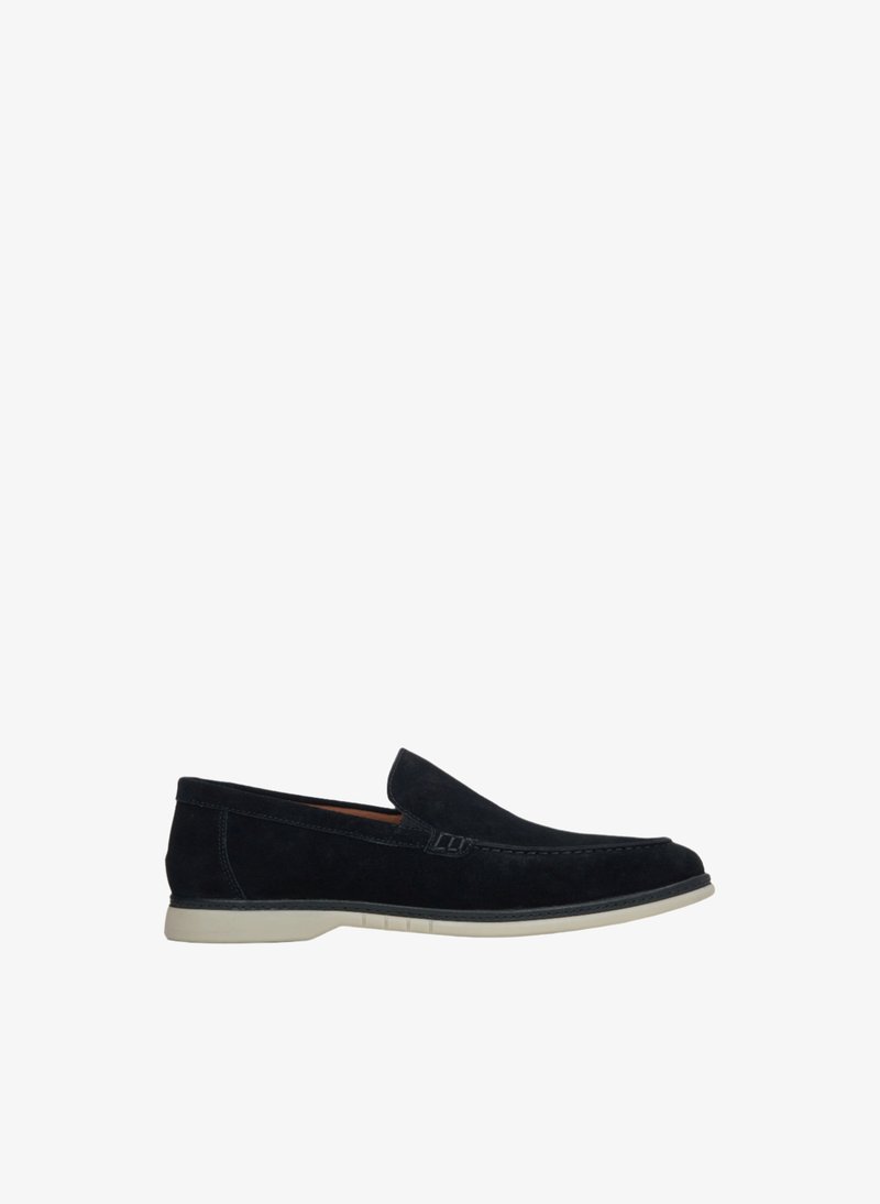 Navy suede slip-on shoe with a rounded toe, featuring contrast stitching and a white rubber outsole. Smooth texture and minimal design accents.