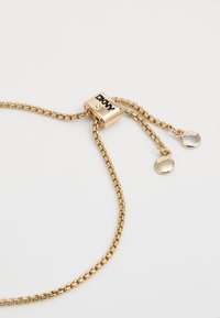 DKNY HEART SLIDER - Bracelet - gold-coloured