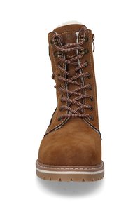 Brown suede boot with a rounded toe, contrasting white stitching, and brown laces. Features a soft inner lining and rubber sole for traction.