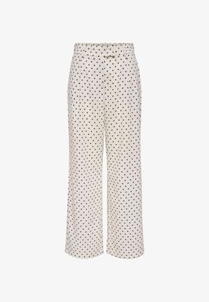 Białe spodnie o szerokich nogawkach w czarne kropki, z szlufkami na pasek, zapinane na guziki z przodu i kieszeniami po bokach.