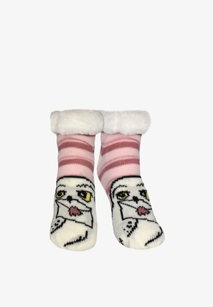 Soft pink and white striped socks with fluffy cuffs and a smiling owl face design on the toes shown against a white background.