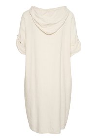 Robe longue beige à capuche avec manches courtes retroussées et maintenues par des pattes à boutons, coupe ample, vue de dos.