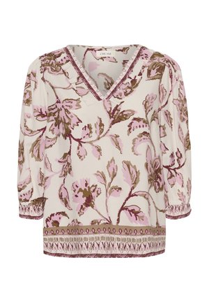 Blommig blus med rosa och bruna blommor, V-ringning med volangkant, trekvarts puffärmar och mönstrad fåll och manschetter.