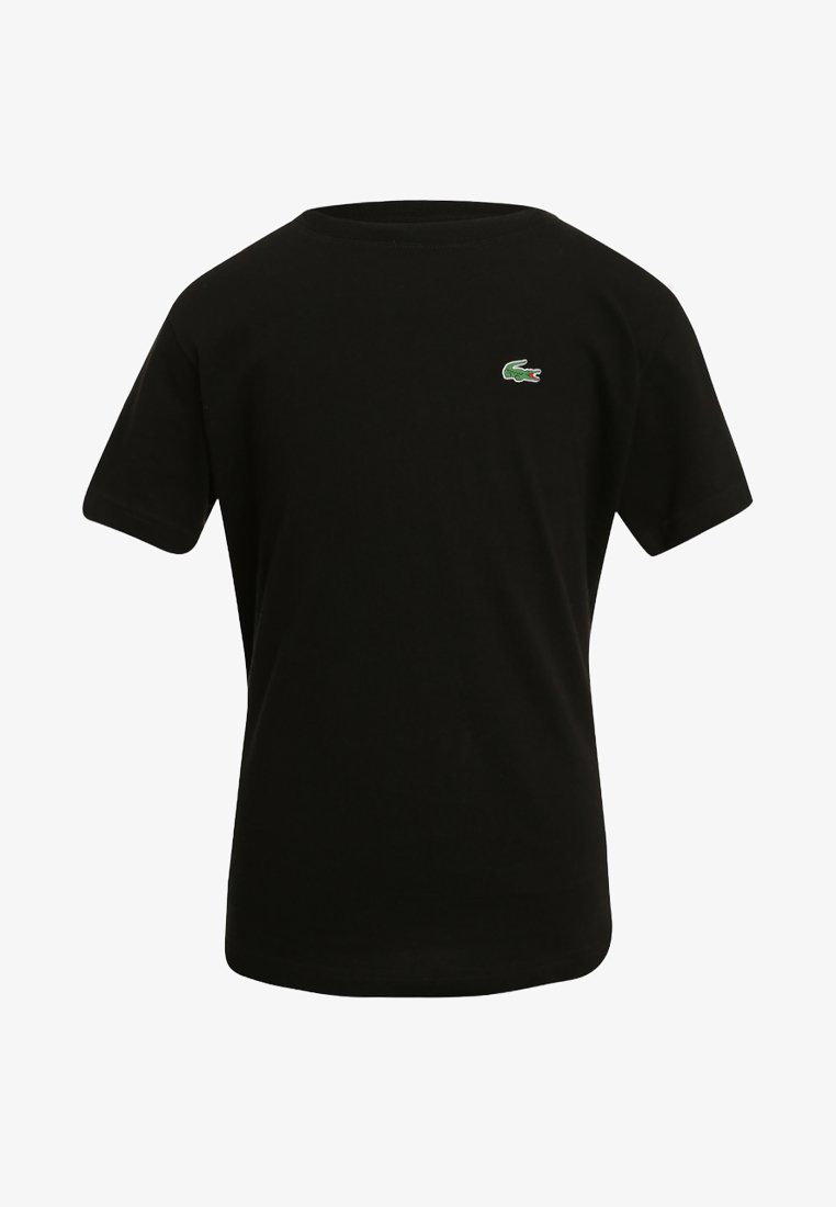 Črna kratka majica s kratkimi rokavi iz bombaža, s majhnim zelenim logotipom krokodila na levem prsnem delu. Enostaven, klasičen dizajn.