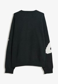 Black knitted sweater with long sleeves, a crew neck, and a large contrasting white graphic on one sleeve. Soft texture, relaxed fit.