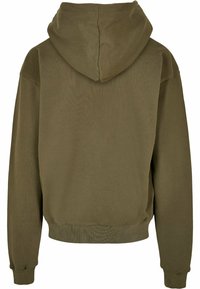 Olive green cropped hoodie, textured cotton fabric, features a large back hood, long sleeves, and ribbed hem and cuffs.