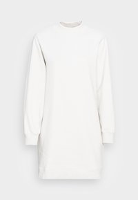 Abito felpa bianco oversize con collo alto, maniche lunghe, polsini a costine e una consistenza morbida. Design semplice senza motivi o grafiche.