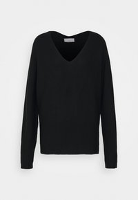 Pull en tricot noir avec un col en V, des manches longues et une coupe décontractée. Le tissu texturé et l'ourlet droit mettent en valeur le design.