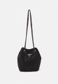 Melna somiņa ar krellītēm un ķēdītes siksnu, tai ir trīsstūra formas logotipa detaļa, gluda tekstūra un mirdzoši akcenti visā somiņā.