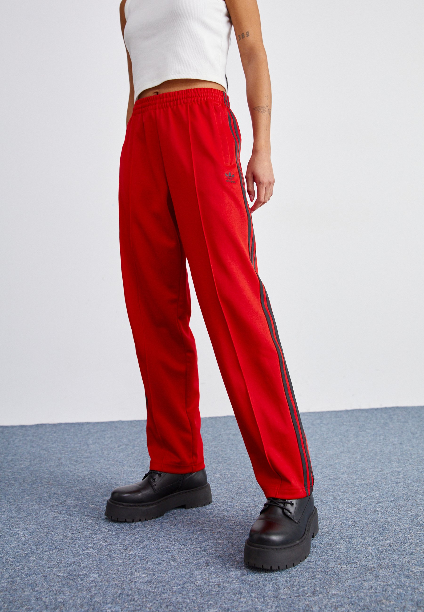 red and black adidas tracksuit bottoms