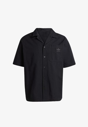 Short-sleeve black button-up shirt made of textured fabric, featuring a chest pocket with a subtle adidas logo. Standard collar style.