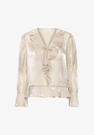 Világos bézs blúz fodros V-kivágással, megkötős részlettel, hosszú puffos ujjal és bővülő aljjal. Az anyag fényes, texturált felületű.