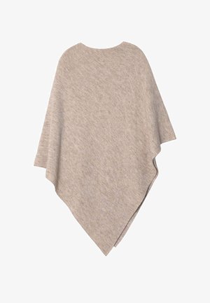 Poncho beige hecho de una tela suave y texturizada con un diseño suelto. Cuenta con un corte asimétrico y amplias aberturas para los brazos que facilitan su uso.