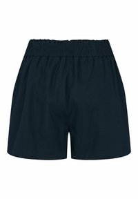 Tmavě modré bavlněné šortky s nařaseným elastickým pasem a volným střihem. Tkanina je hladká, bez viditelných vzorů nebo dekorací.