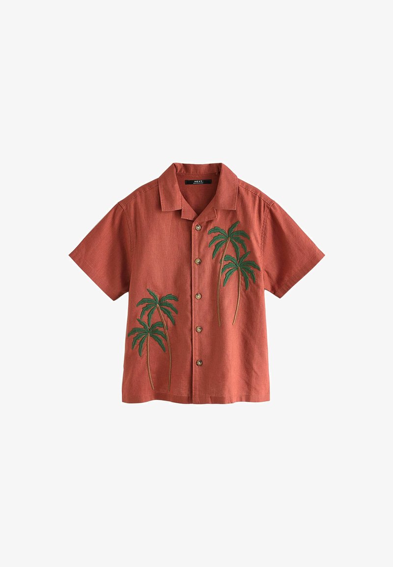 Kortærmet skjorte i brændt orange stof med palmetræ-embroidery i grøn. Har en krave og brune knapper.
