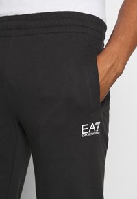 EA7 Emporio Armani Träningsbyxor - black
