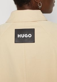 HUGO ANDERI - Jeansjacke - open beige