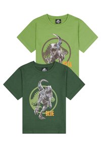 Dos camisetas de manga corta de algodón, una en verde y otra en verde oscuro. Cada una presenta un gráfico de dinosaurio con los nombres "Beta" y "Blue" en color naranja.