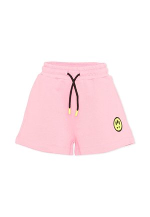 Różowe szorty z czarnymi sznurkami zakończonymi żółtymi końcówkami oraz małą żółtą buźką z kłami na prawej nogawce.