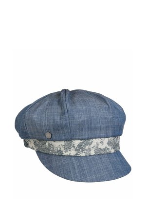Blue denim newsboy cap with a patterned white and blue fabric band and a small round metal logo pin on the side.