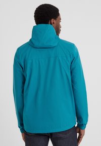 Turquoise waterproof jacket with a hood, elastic cuffs, and a relaxed fit. Smooth texture, lightweight material, and simple design.
