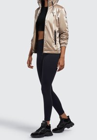 khujo Regenjas - beige