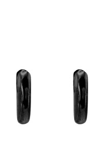 Schwarze keramische Creolen mit einer glatten, glänzenden Oberfläche. Jede Ohrringe ist abgerundet und hat oben eine leichte Verjüngung.