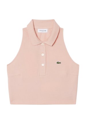 Mouwloze lichtroze korte poloshirt met drie knopen en een klein groen krokodillenlogo op de borst.