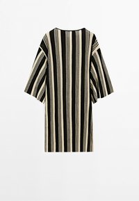 Loose-fitting tunic with wide half sleeves, featuring vertical black and beige stripes on a plain white background. No visible fastenings.
