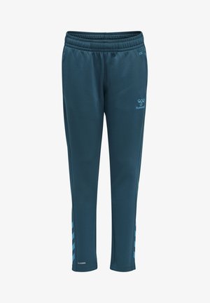 Mjuka, mörk teal joggers med resårband i midjan, sidofickor och ljusblå diagonala ränder längs yttre sömmarna. Hummel-logotyp framtill.
