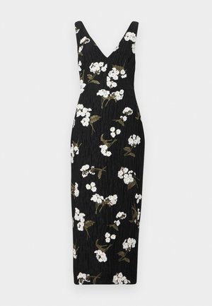 Robe noire ajustée avec un décolleté en V, ornée de broderies florales blanches et de feuilles vertes. Tissu texturé, design longueur genou.