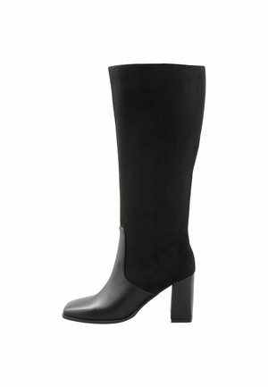 Black knee-high women's boot with block heel, smooth leather lower and suede upper shaft, side view on white background.