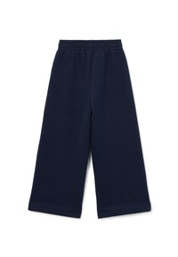 Navyweite Beinhosen aus weichem Stoff, mit einem elastischen Bund und einem sauberen Saum am Knöchel, sowie einer dezenten strukturierten Oberfläche.