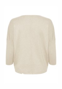 Bež suurendada kampsun, millel on nahkhiire tiivad, pehme tekstuur ja ümmargune kaelus, näidatud tagant.