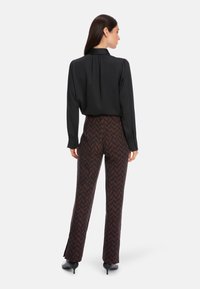 Marc Cain FATSA - Stoffhose - deep wood