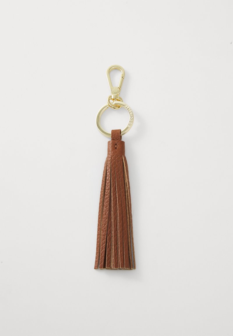 porte-clés en cuir brun avec un clip et un anneau dorés, présentant une finition texturée et plusieurs franges pour un détail supplémentaire.