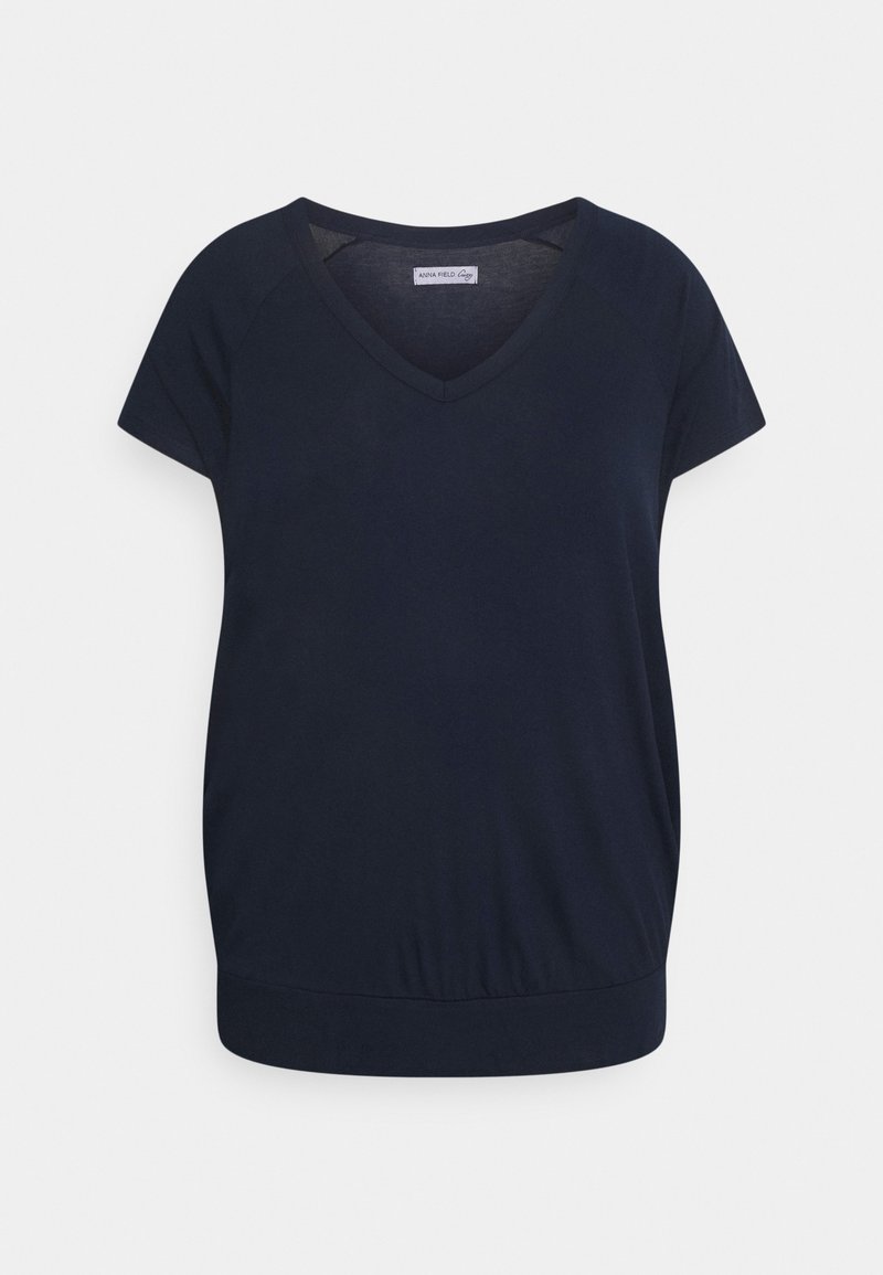 Mörkblå kortärmad topp med V-ringning, tillverkad av mjukt material, med en rynkad nederkant för en avslappnad passform. Enkelt mönster, utan tryck.