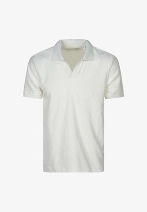 Polo blanc à manches courtes avec motif floral texturé et col ouvert, présenté sur un fond uni.